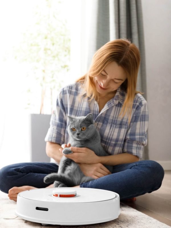 robot-vacuum-cleaner-girl-and-cat-in-living-room-interior-smart-home-concept-.jpg